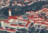 Beispiel eines 3D-Gebäudemodells im Detaillierungsgrad LoD2 (l.u. Schlosskirche in Wittenberg)